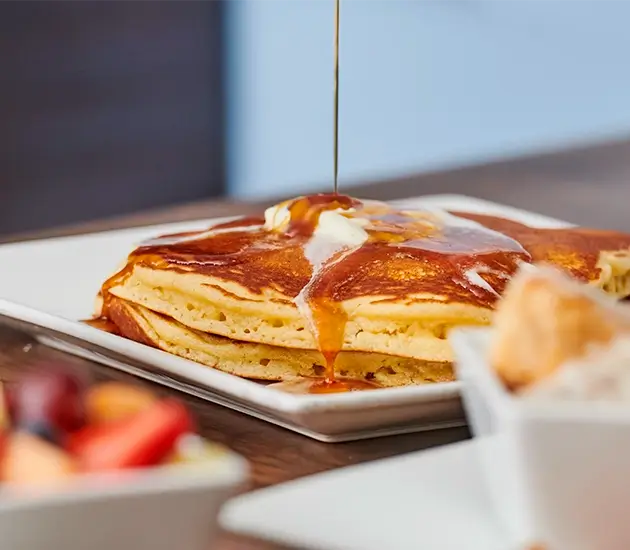 short stacks offers tall stacks of pancakes on their breakfast menu